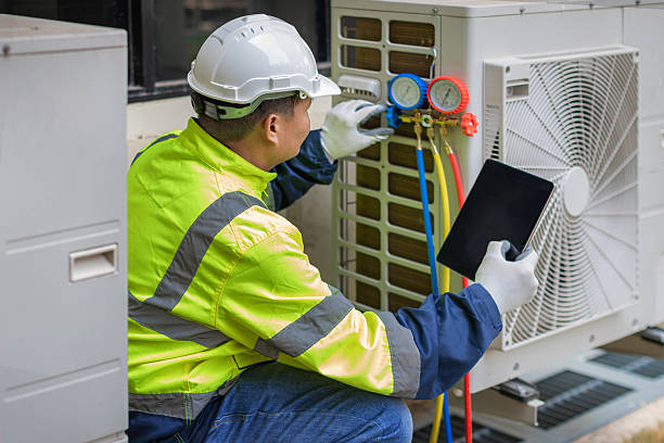 Professional Heat Pump Repair technician working in McAllen, TX